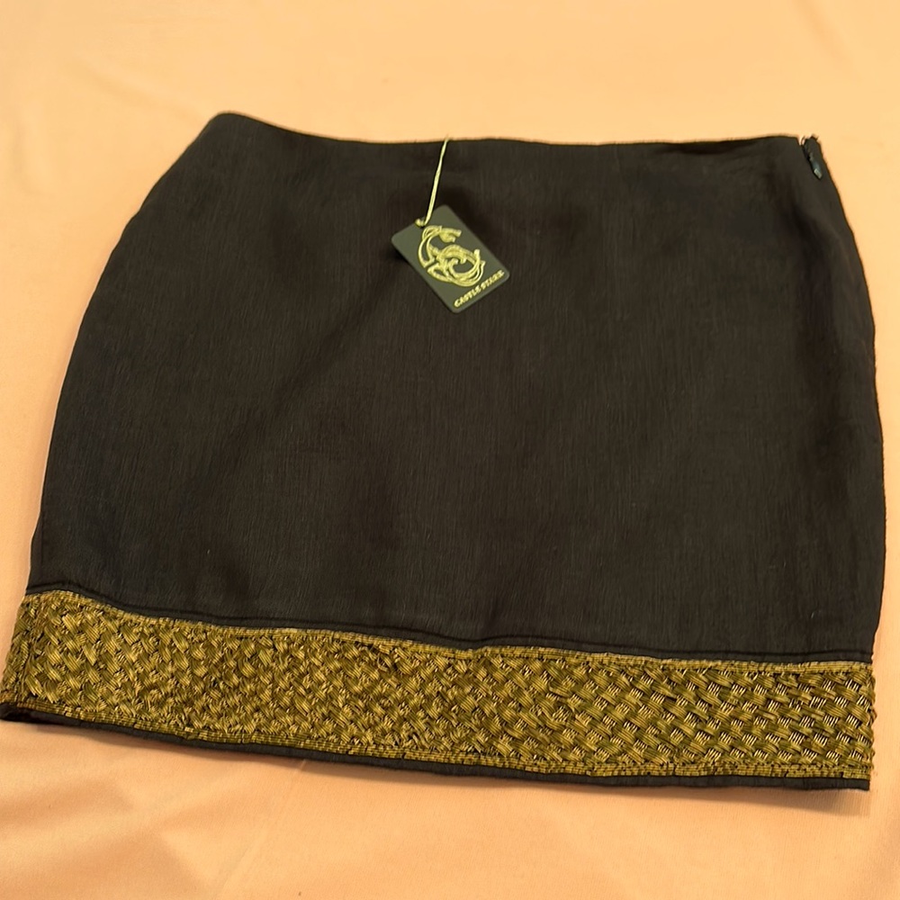 Lined black mini skirt. Size 4.
